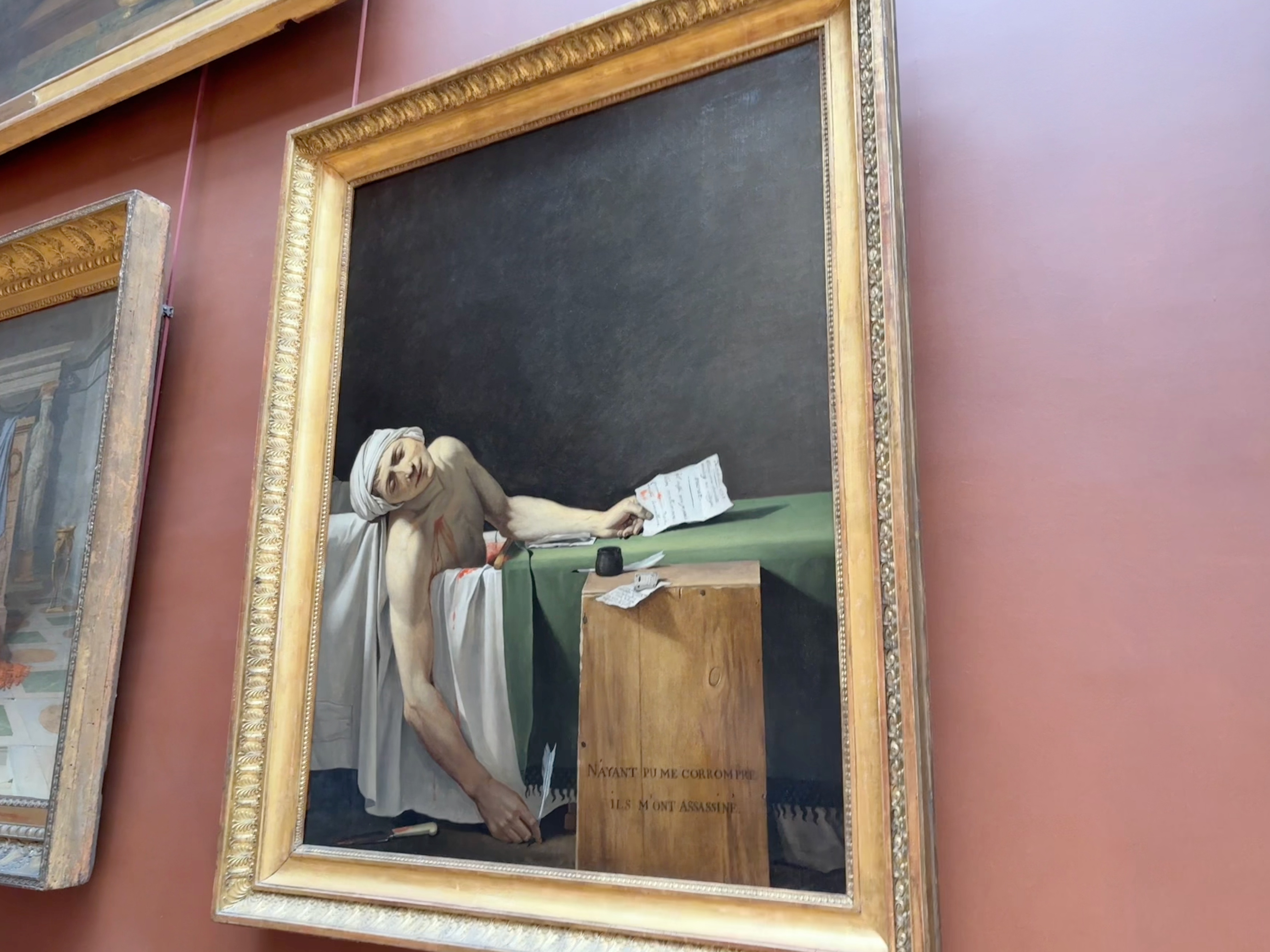 The Death of Marat on display at the Louvre