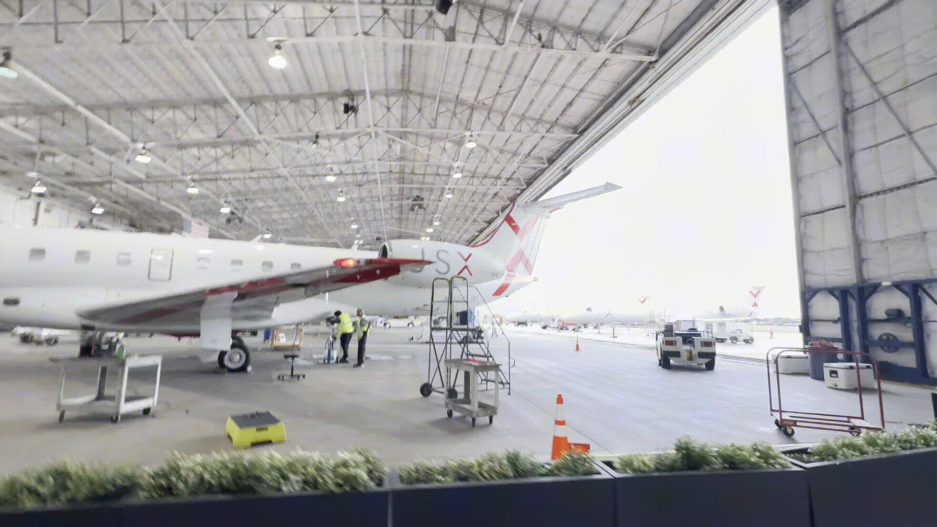 jsx jet in a hangar