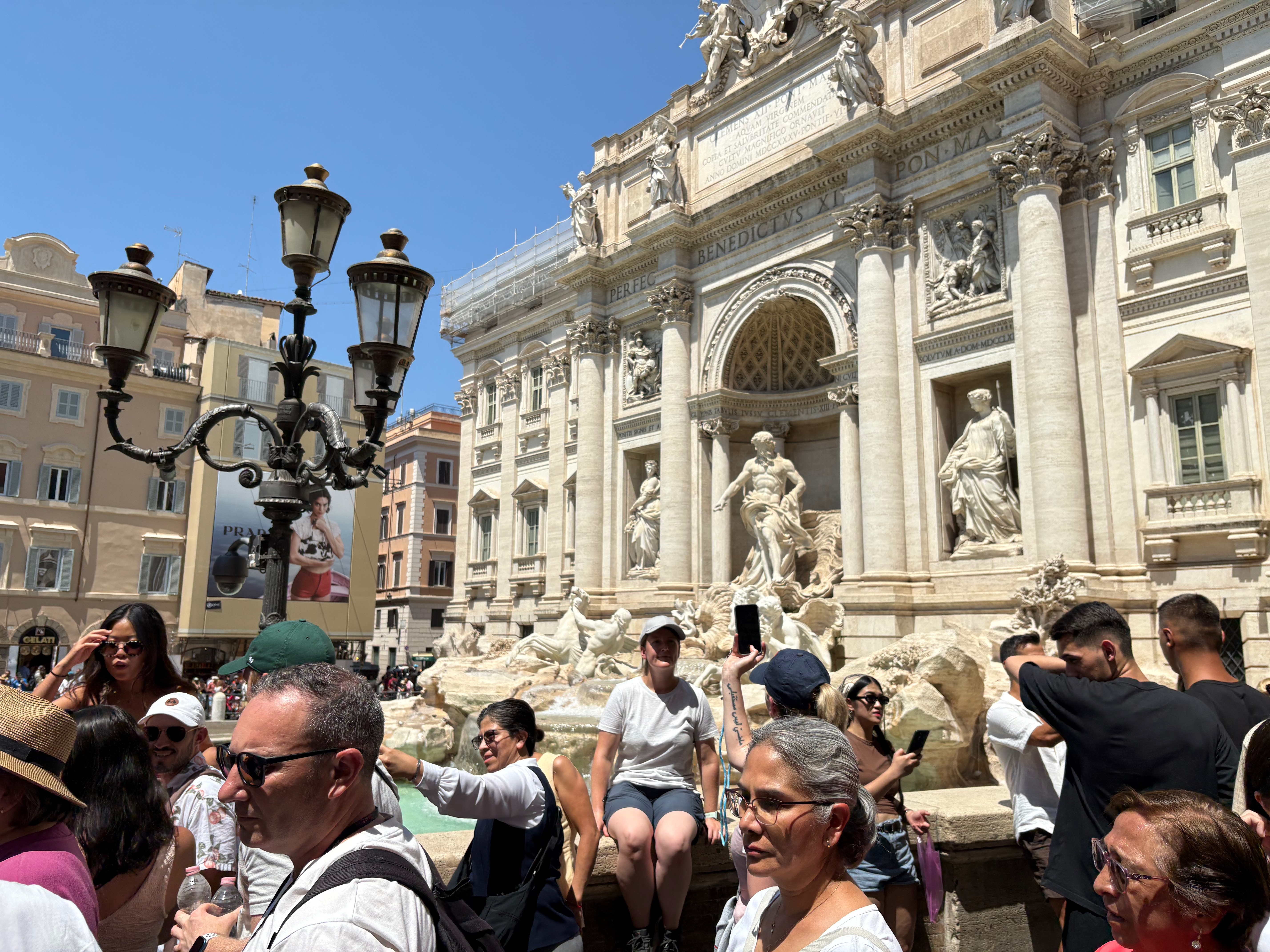 large crowd at Trevi Fountain
